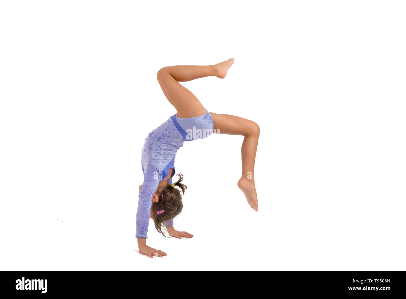 Little gymnast on a white background Stock Photo