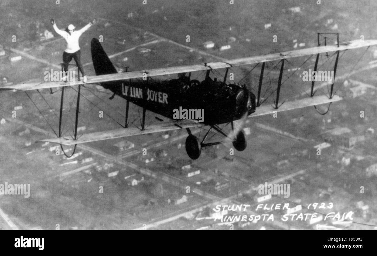 Lillian Boyer (January 15, 1901 - February 1, 1989) was an American wing walker. Working as a restaurant waitress but eager to fly in an airplane, in 1921 Boyer was invited by two restaurant customers to take an airplane ride. On her second flight, she climbed out on the wing, beginning her career as an aerial performer. In December 1921, she began training with pilot Lt. Billy Brock, former WWI pilot and barnstormer. Stock Photo