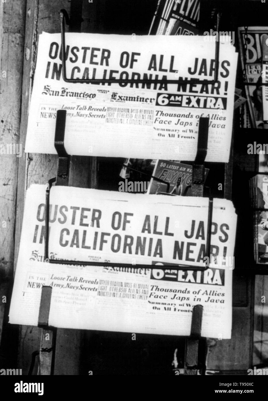 Entitled: 'Newspaper headline. Oakland, California, February 1942.' The internment of Japanese-Americans during WWII was the forced relocation and incarceration in camps of 110,000-120,000 people of Japanese ancestry (62% of the internees were US citizens) ordered by President Roosevelt shortly after Japan's attack on Pearl Harbor. Japanese-Americans were incarcerated based on local population concentrations and regional politics. Stock Photo