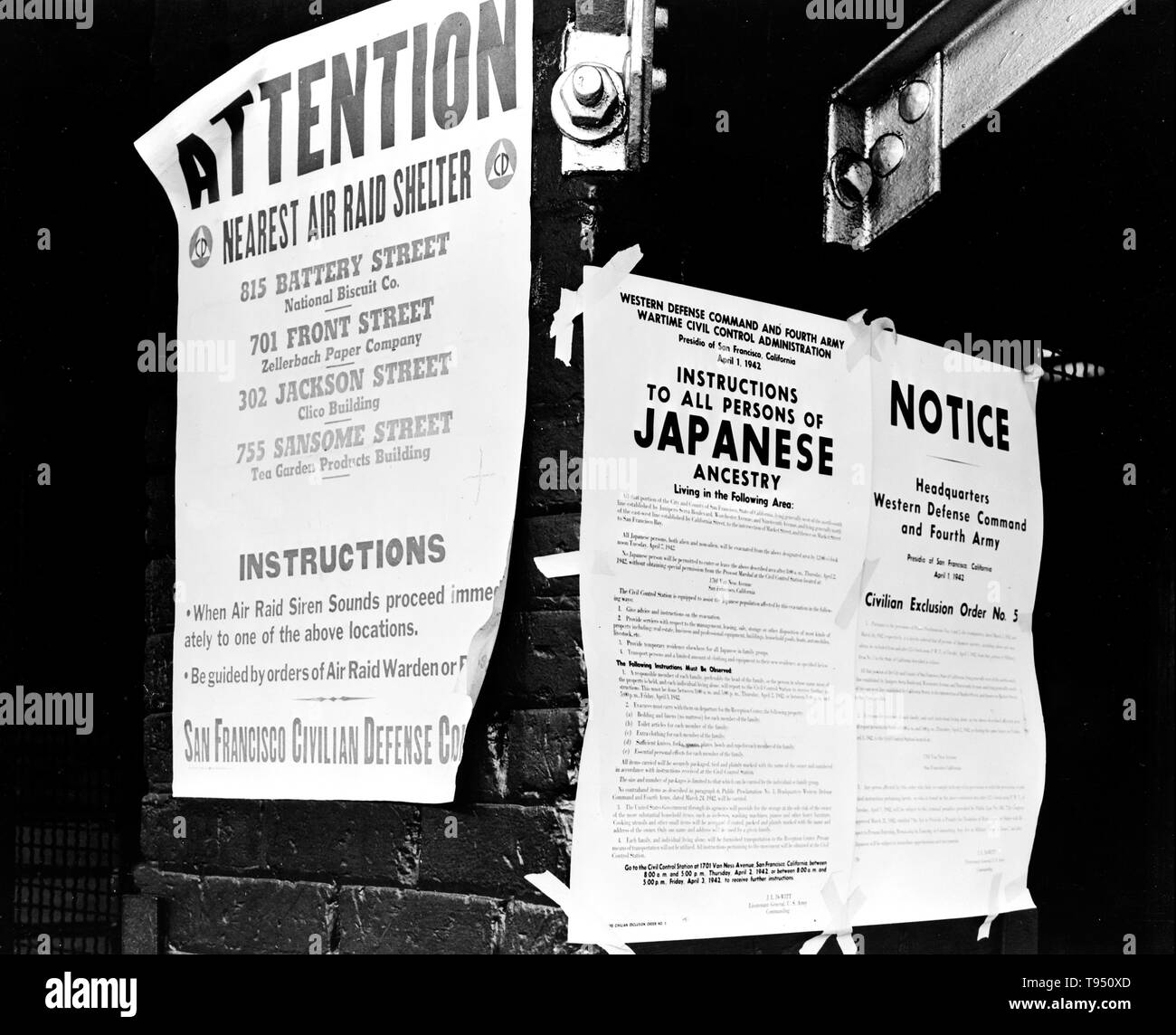 Entitled: 'Civilian exclusion order #5, posted at First and Front streets, directing removal by April 7 of persons of Japanese ancestry, from the first San Francisco section to be affected by evacuation.' The internment of Japanese-Americans during WWII was the forced relocation and incarceration in camps of 110,000-120,000 people of Japanese ancestry (62% of the internees were US citizens) ordered by President Roosevelt shortly after Japan's attack on Pearl Harbor. Stock Photo