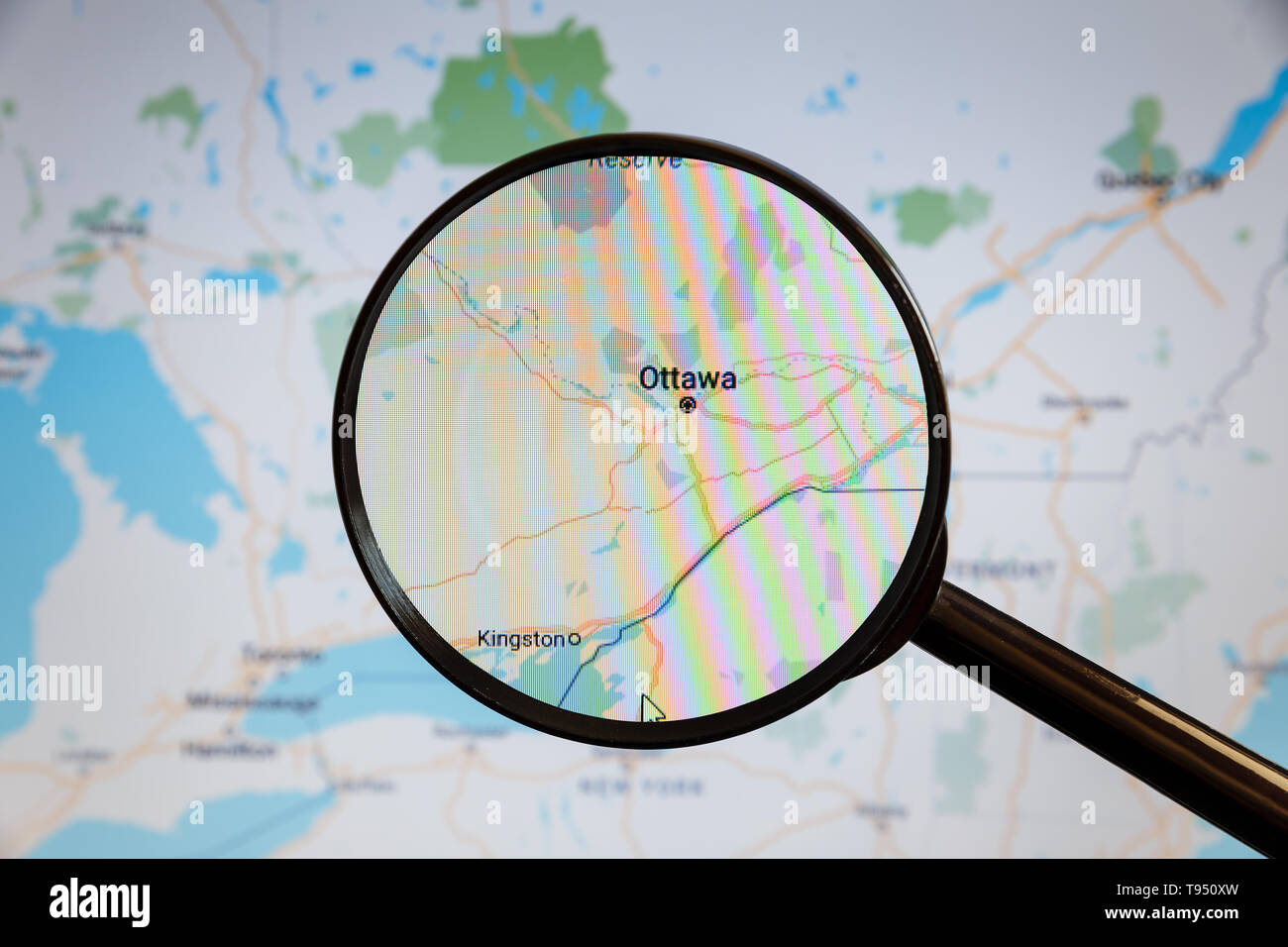 Ottawa, Canada. Political map. The city on the monitor screen through a magnifying glass. Stock Photo