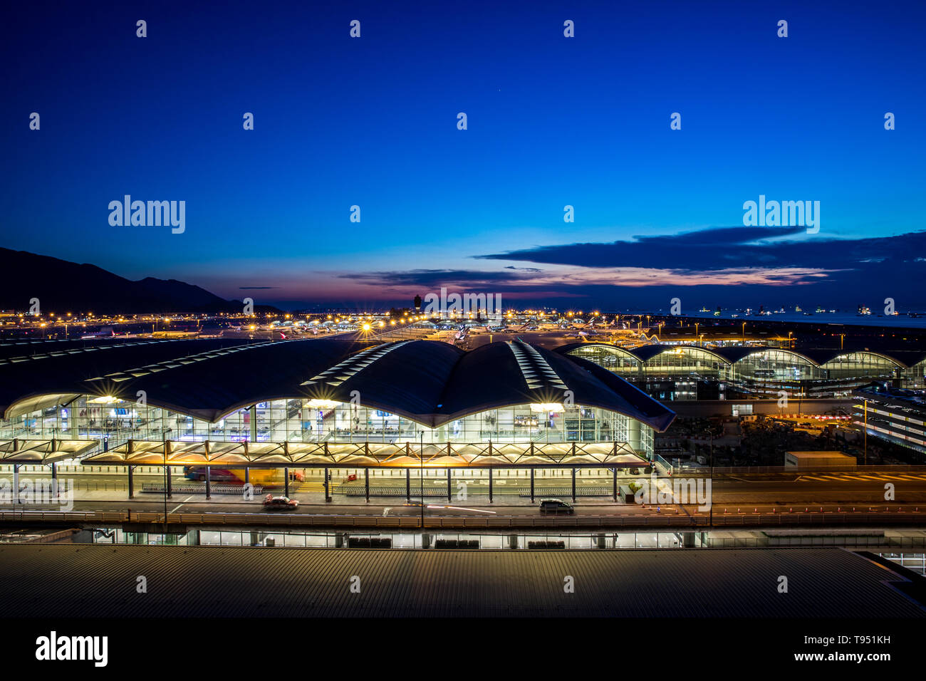 Hong Kong international airport at twilight Stock Photo