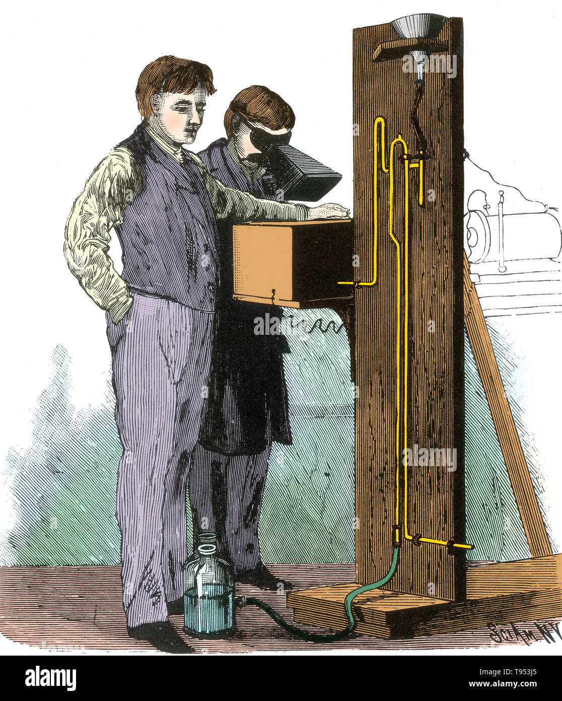 In 1895, Thomas Edison investigated materials' ability to fluoresce when exposed to X-rays, and found that calcium tungstate was the most effective substance. Around March 1896, the fluoroscope he developed became the standard for medical X-ray examinations. He dropped X-ray research around 1903, even before the death of Clarence Madison Dally, one of his glassblowers. Stock Photo