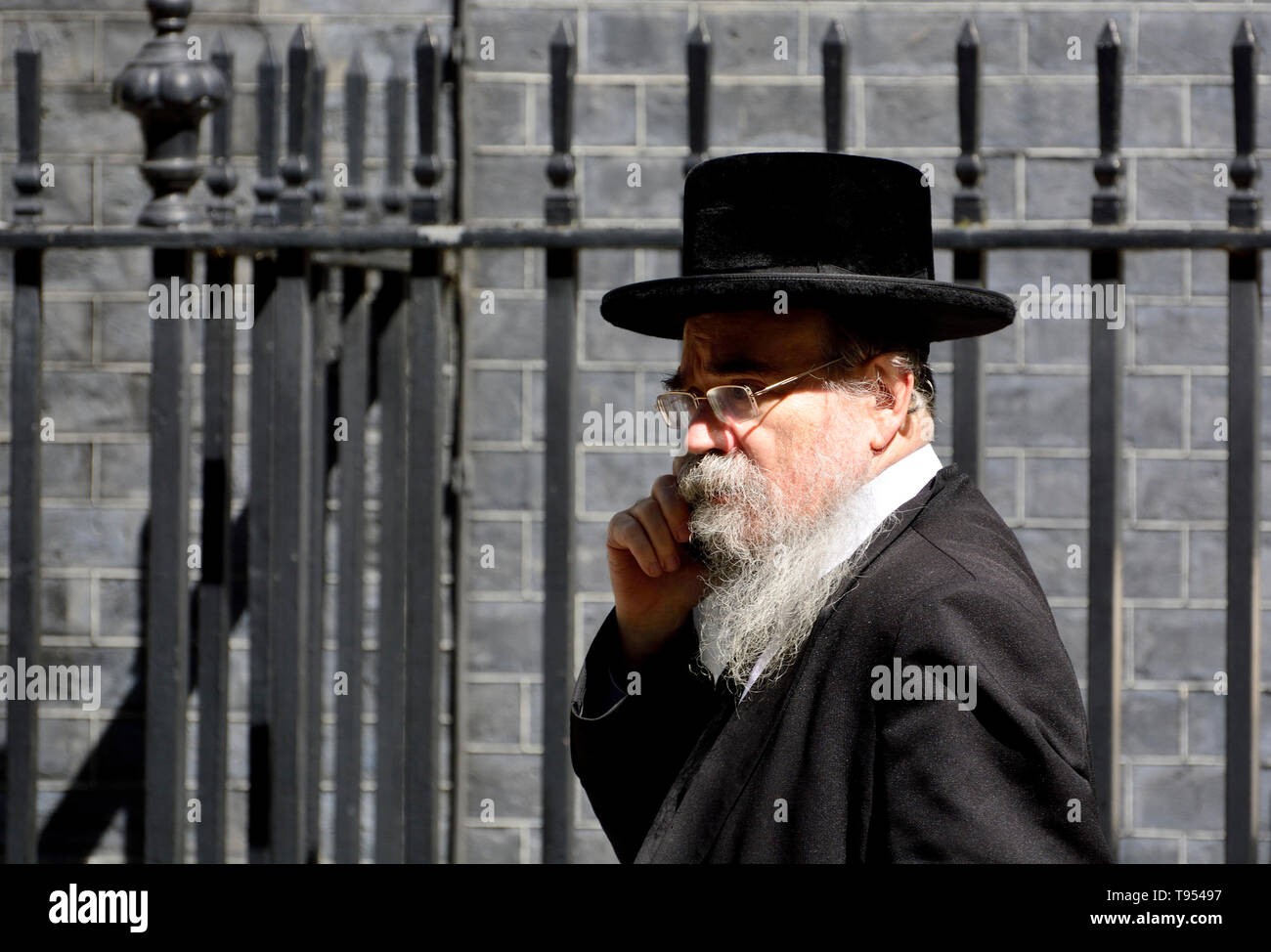 London, England, UK. Abraham Pinter - Haredi rabbi/politician from Stamford Hill,  represents Haredi interests on the London Jewish Forum. On his mobi Stock Photo