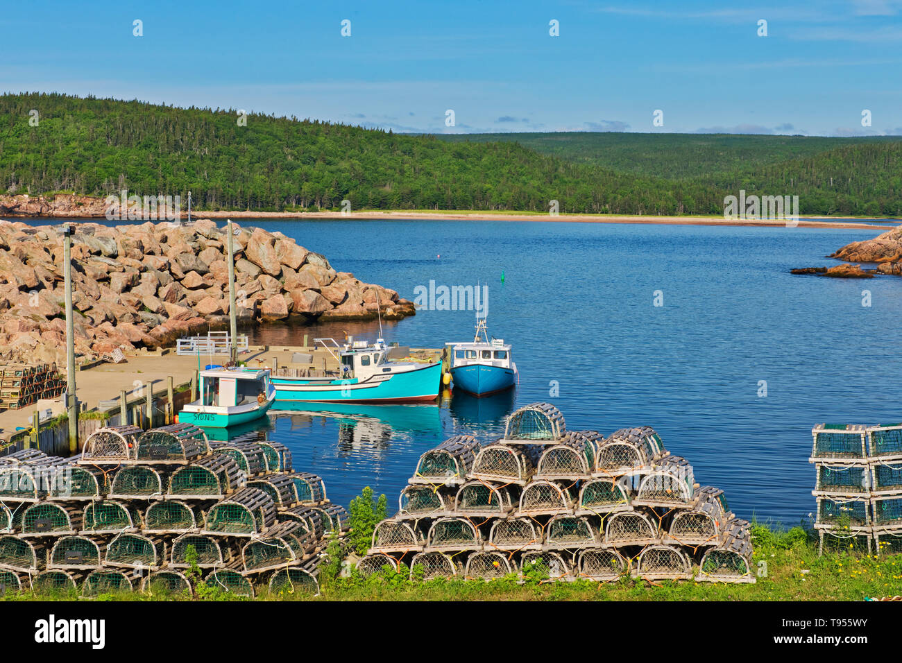 Fishing boats in coastal village. Cabot Trail. Cape Breton Island.  Neils Harbour Nova Scotia Canada Stock Photo