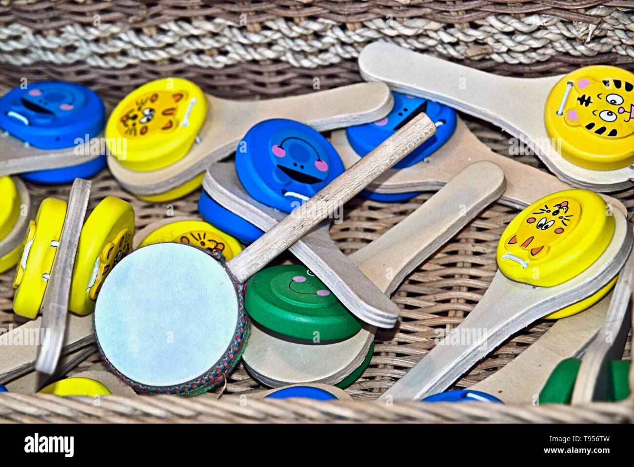 Colorful wooden music instruments for children at a market Stock Photo