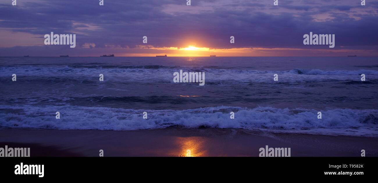 Armada,Tanker ships of the coast with Sunrise in Panoramic format Stock Photo