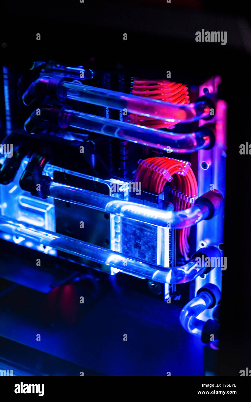 Inside a high performance computer. Computer circuit board and CPU cooling  fans illuminated by internal LEDs inside a server class computer Stock  Photo - Alamy
