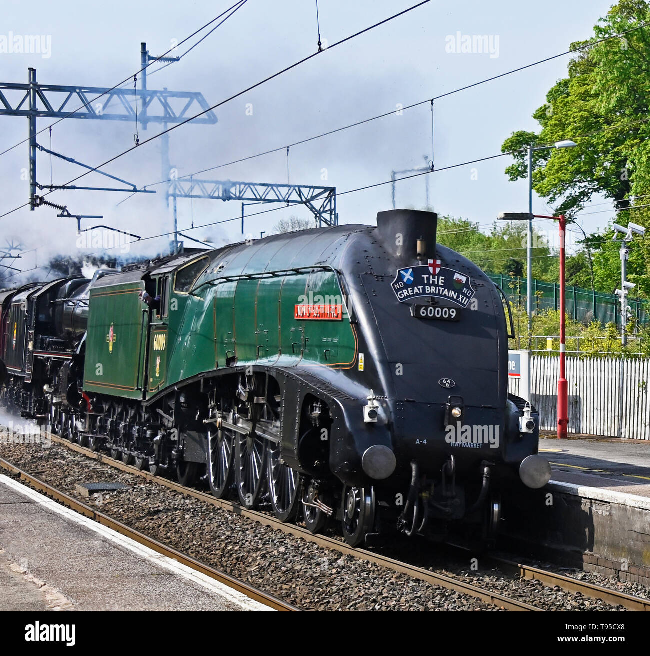 Class A4 Pacific Steam Locomotive No.60009 'Union of South Africa' double-heading with LMS Class 5 No.44871, 'The Great Britain XII' special  at speed. Stock Photo