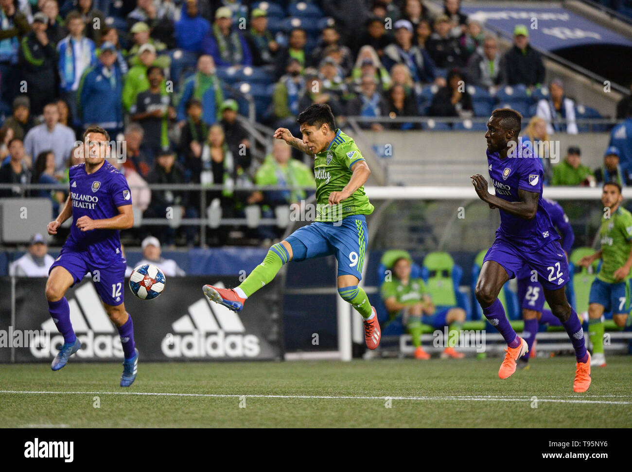 Seattle, Washington, USA. 15th May, 2019. Seattle forward Raul Ruidiaz (9) tries to gain contol of the ball between two Orlando defenders as Orlando City visits the Seattle Sounders for an MLS match at Century Link Field in Seattle, WA. Seattle won the match 2-1. Credit: Jeff Halstead/ZUMA Wire/Alamy Live News Stock Photo