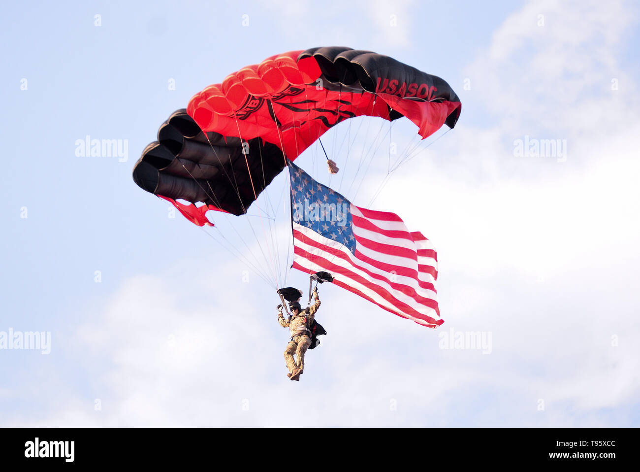 St Louis, USA. 16th May, 2019. An Army skydiver flies into the stadium with the United States flag during the send off series as the United States Women's National Team hosted New Zealand at Busch Stadium in St. Louis City, MO Ulreich/CSM/Alamy Live News Stock Photo