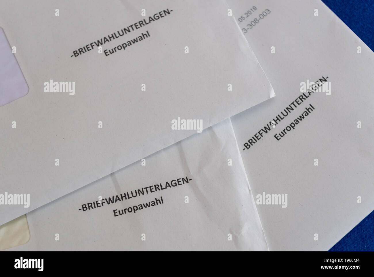 Dresden, Germany. 17th May, 2019. ILLUSTRATION - Voting papers for the European Parliament postal ballot are superimposed on each other. Credit: Robert Michael/dpa-Zentralbild/dpa/Alamy Live News Stock Photo