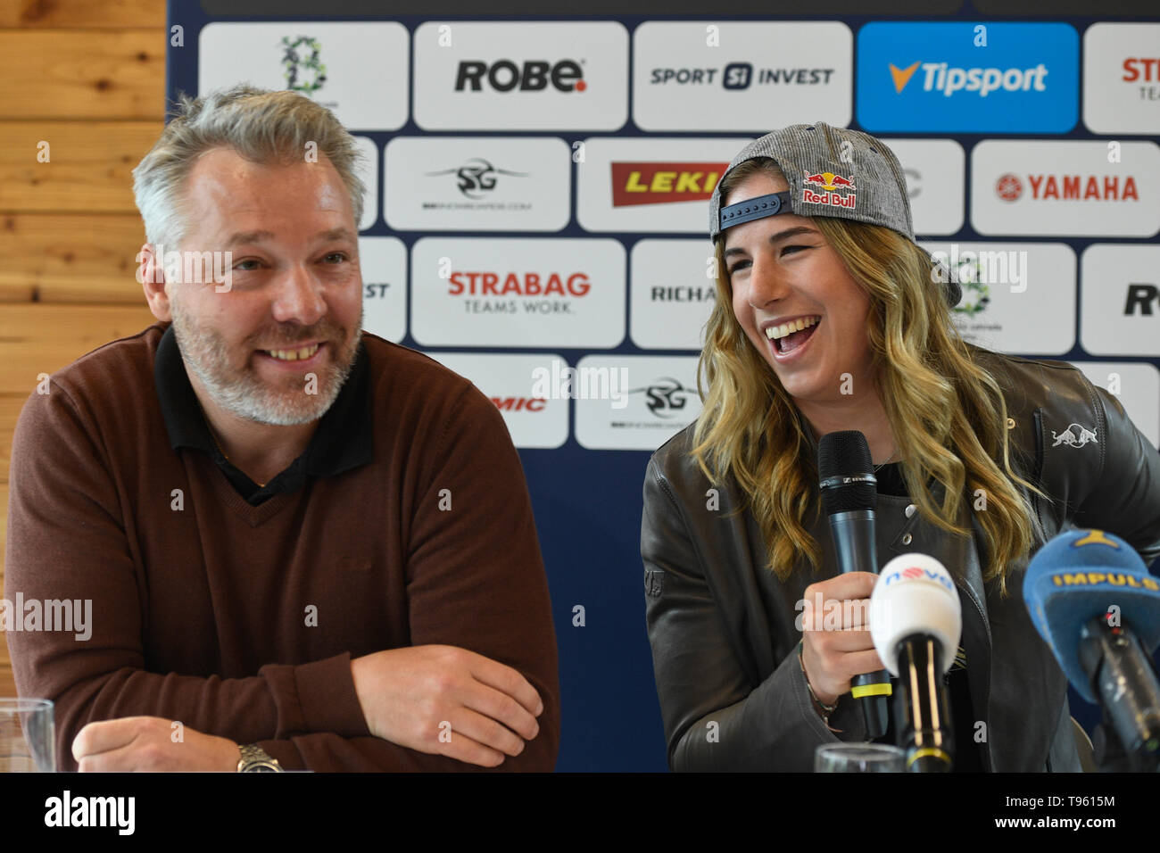 Prague, Czech Republic. 17th May, 2019. Czech snowboarder and alpine skier  Ester Ledecka, right, and her coach Tomas Bank smile during a meeting with  journalists in Prague, Czech Republic, on May 17,