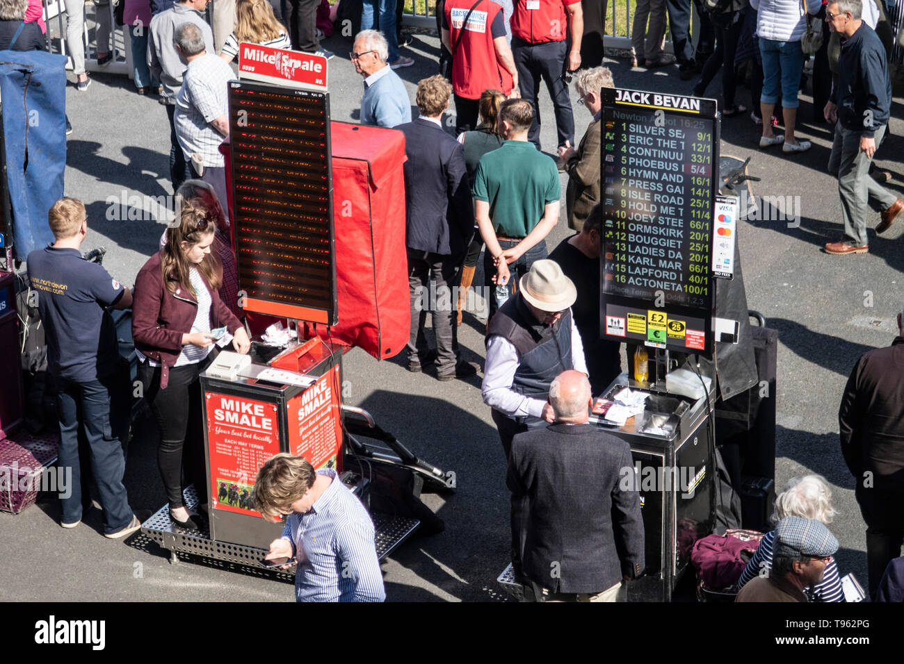 Track side bookmakers at Newton Abbot racecourse, Devon, UK. Bookies at the races, horse racoing course. Stock Photo