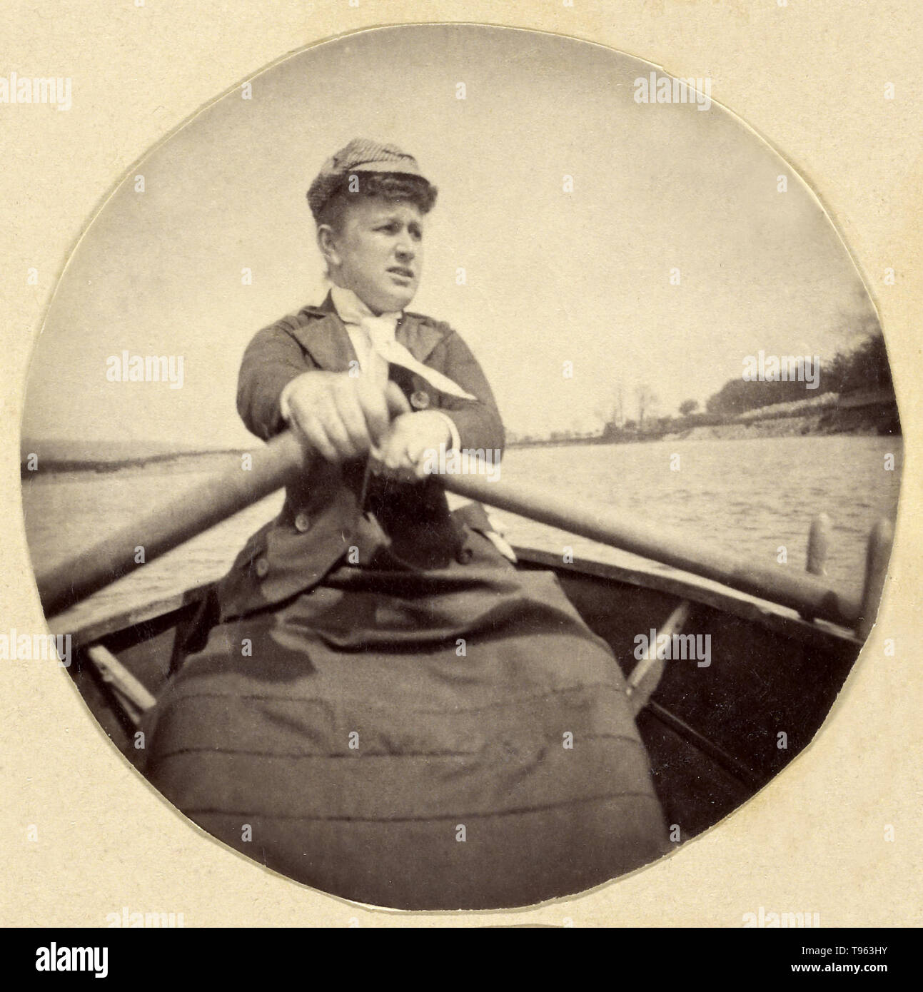 Woman in hat rowing a boat, c. 1888. Albumen silver print. This photograph displays both an unusual perspective and some less common subject matter: an outdoor action shot of a woman physcially exerting herself. In 1888, the Kodak No.1 camera allowed amateurs to shoot scenes that had once been taken only by professional photographers. This broadened the range of subject matter and allowed for a more spontaneous documentation of daily life. Stock Photo