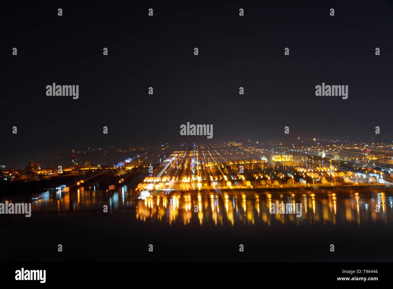 aerial view of dark cityscape with illuminated buildings at night Stock ...