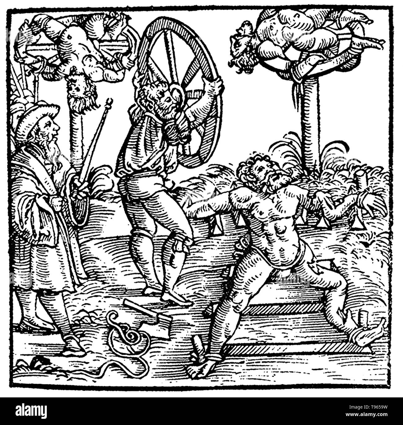 The breaking wheel, also known as the Catherine wheel or simply the wheel, was a torture device used for capital punishment from antiquity into early modern times for public execution by breaking the criminal's bones/bludgeoning him to death. As a form of execution, it was used from classical times into the 18th century; as a form of post mortem punishment of the criminal, the wheel was still in use in 19th century Germany. Stock Photo