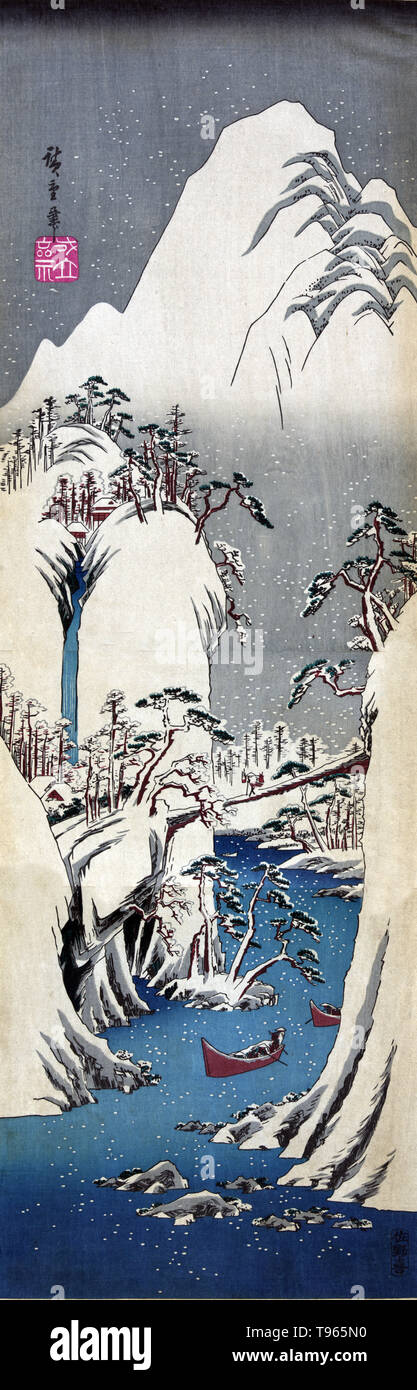 Fujigawa joryu secchu. Going up the Fuji River in winter. two boats on the Fuji River in a steep canyon, with bridge spanning the river, in a snow-covered landscape during winter. Ukiyo-e (picture of the floating world) is a genre of Japanese art which flourished from the 17th through 19th centuries. Ukiyo-e was central to forming the West's perception of Japanese art in the late 19th century. The landscape genre has come to dominate Western perceptions of ukiyo-e. Stock Photo