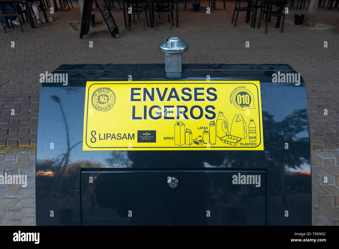 A recycling bin for glass and plastic Stock Photo - Alamy