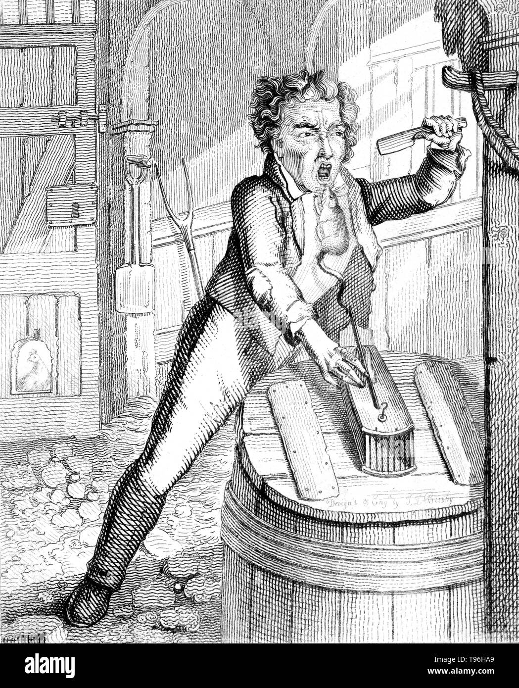 A man goes into a barn and opens a rat trap; a rat jumps put and bites him on the chin. Rat-catchers may attempt to capture rats themselves, or release ratters, animals trained or naturally skilled at catching them. They may also set a rat trap or other traps. Etching by Thomas Lord Busby, 1826. Stock Photo