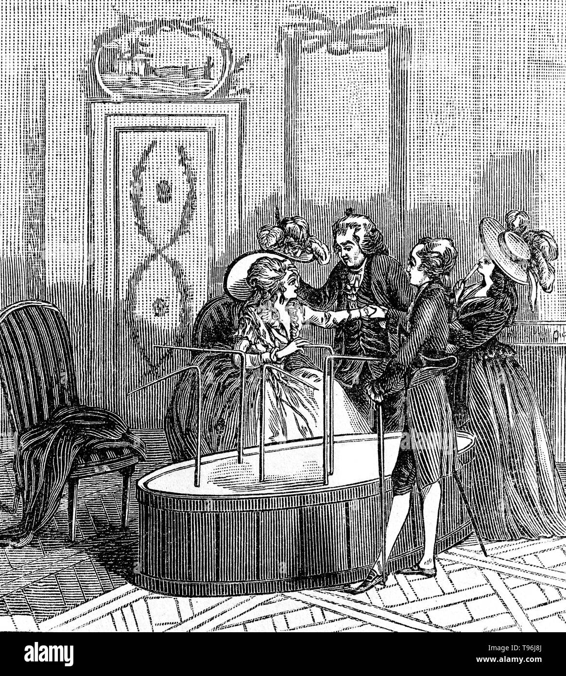 Le Baquet de Mesmer. In the middle of the room is placed a vessel of about a foot and a half high which is called here a baquet. It is so large that twenty people can easily sit round it; near the edge of the lid which covers it, there are holes pierced corresponding to the number of persons who are to surround it; into these holes are introduced iron rods, bent at right angles outwards, and of different heights, so as to answer to the part of the body to which they are to be applied. Stock Photo