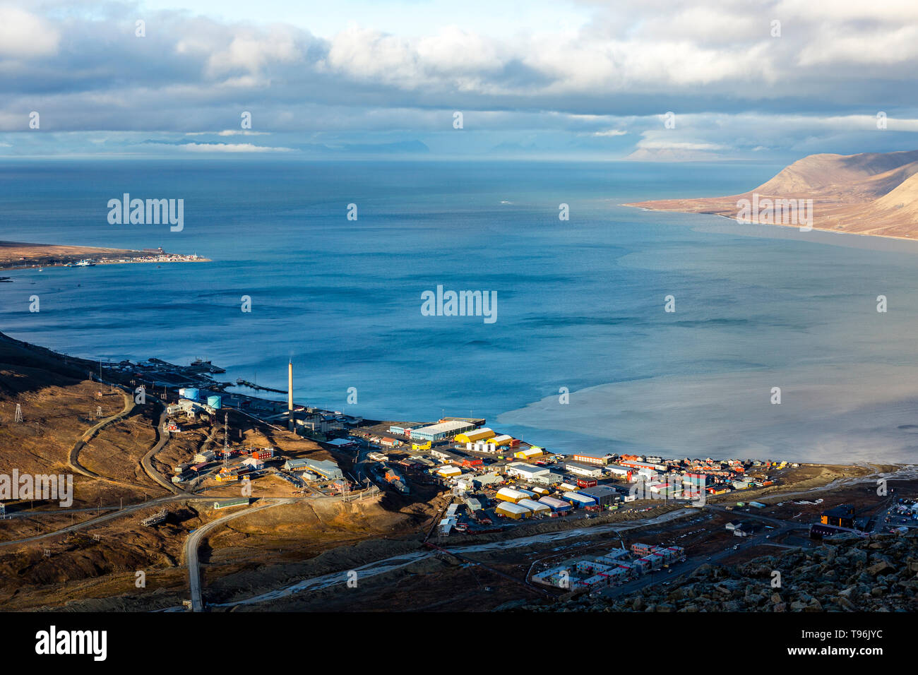 Hiking along the mountains - View over Longyearbyen and adventdalen fjord from above - the most Northern settlement in the world. Svalbard, Norway Stock Photo