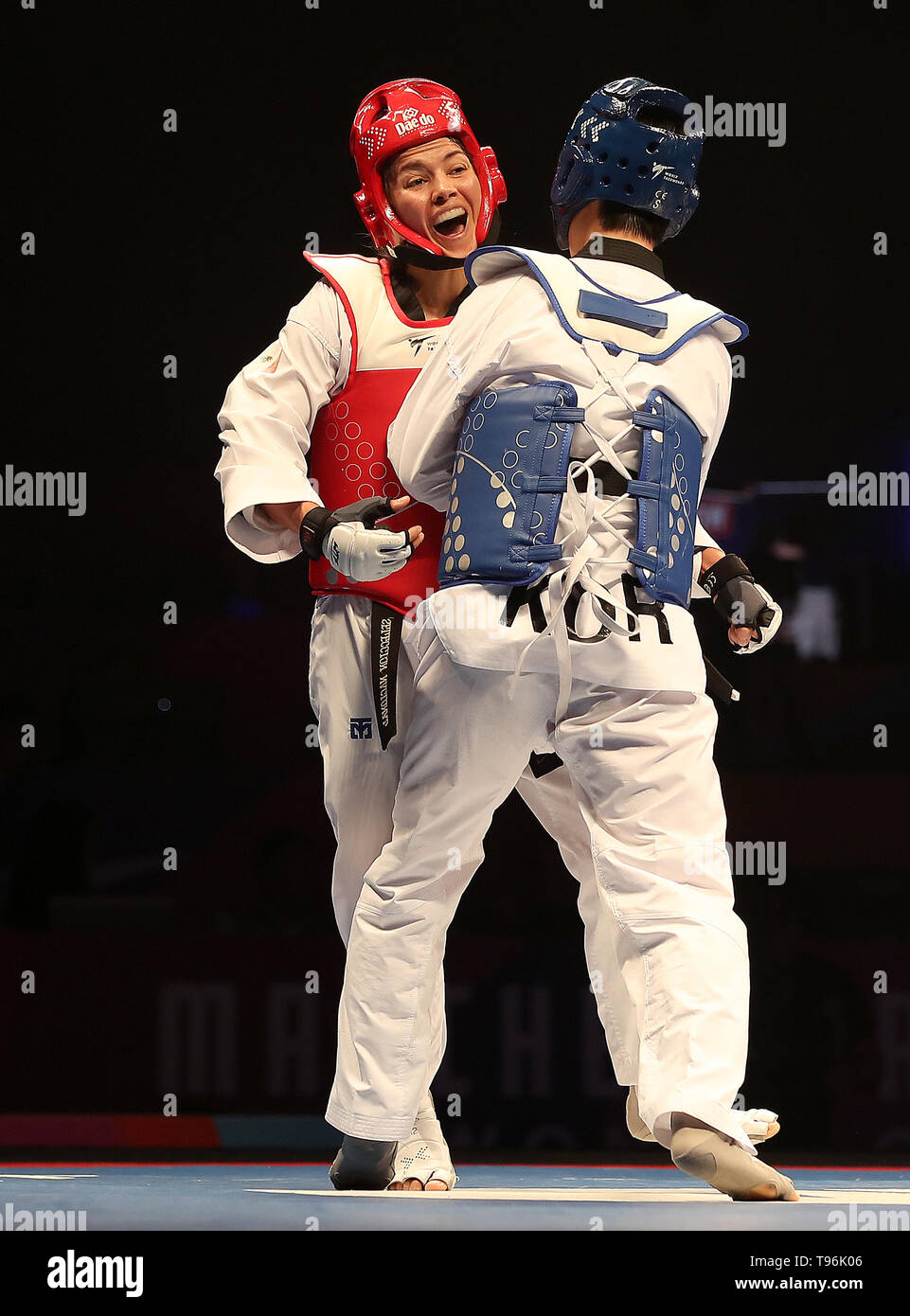 Mexico's Maria Espinoza (left) on her way to taking silver in the Women's -73 final against Korea's Da-bin Lee, during day two of the World Taekwondo Championships at Manchester Arena. Stock Photo