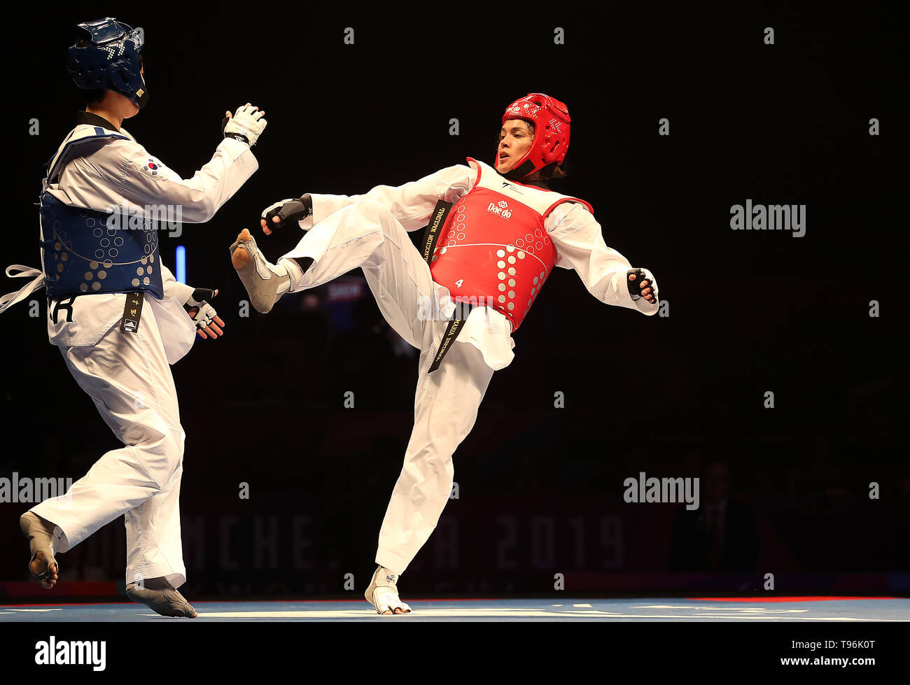 Mexico's Maria Espinoza (right) on her way to taking silver in the Women's -73 final against Korea's Da-bin Lee, during day two of the World Taekwondo Championships at Manchester Arena. Stock Photo