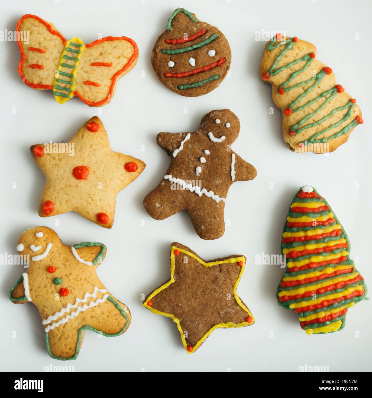 decorated gingerbread cookies on white plate Stock Photo