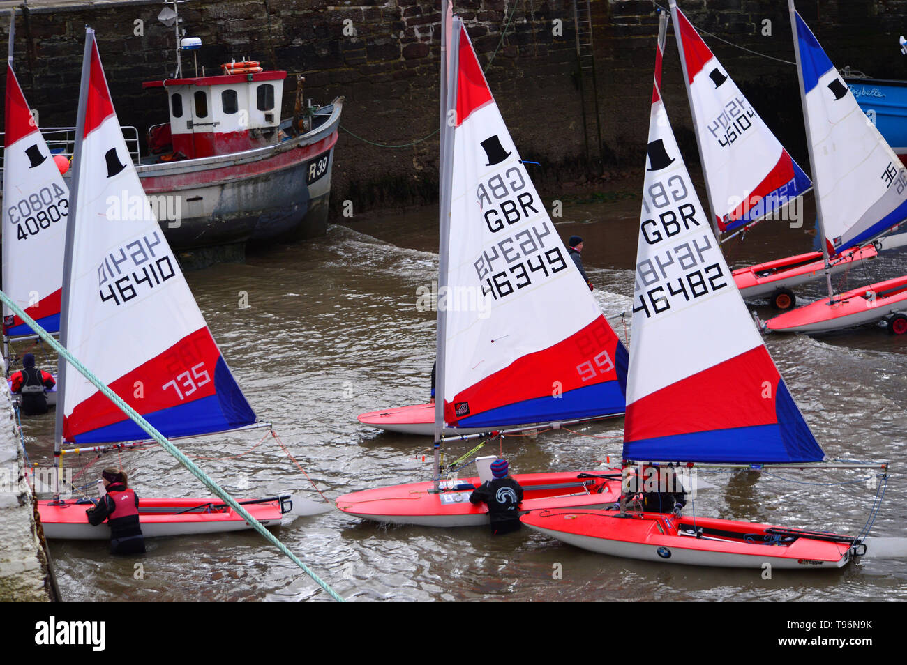 Topper sailing dinghies launching from Paignton Hrbour, prior to their Regional Training Squad Session and Competition on Sundy, April 27, 2014. Stock Photo