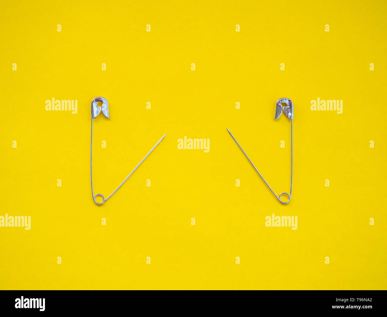 Lots of safety pins. Team concept Stock Photo Alamy