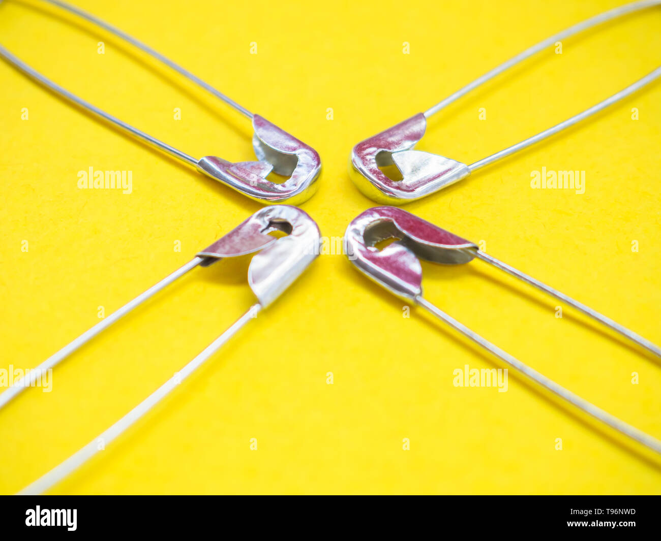 Lots of safety pins. Team concept Stock Photo Alamy