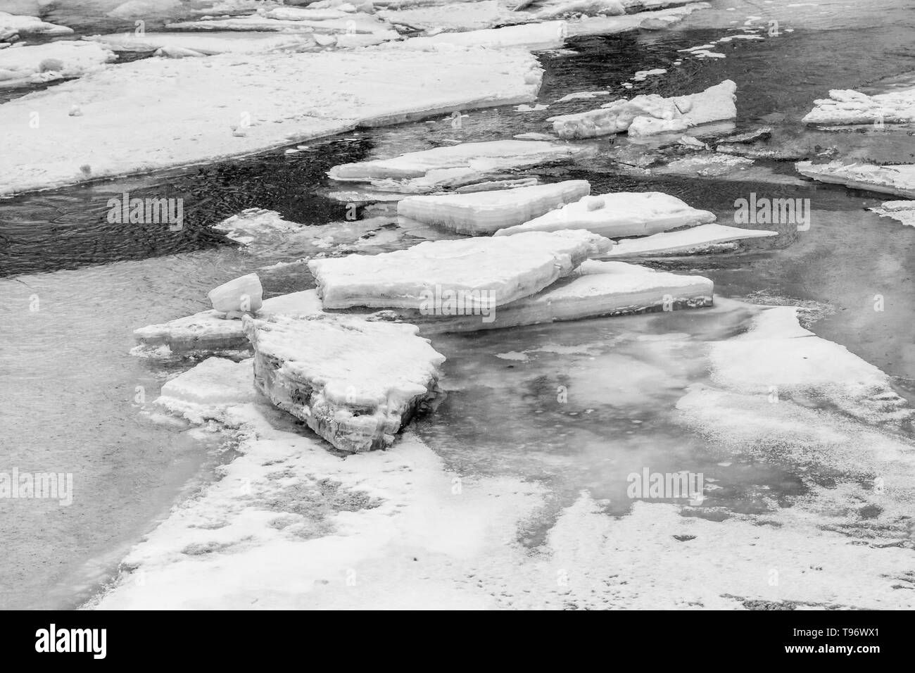 Ice on frozen river Stock Photo Alamy
