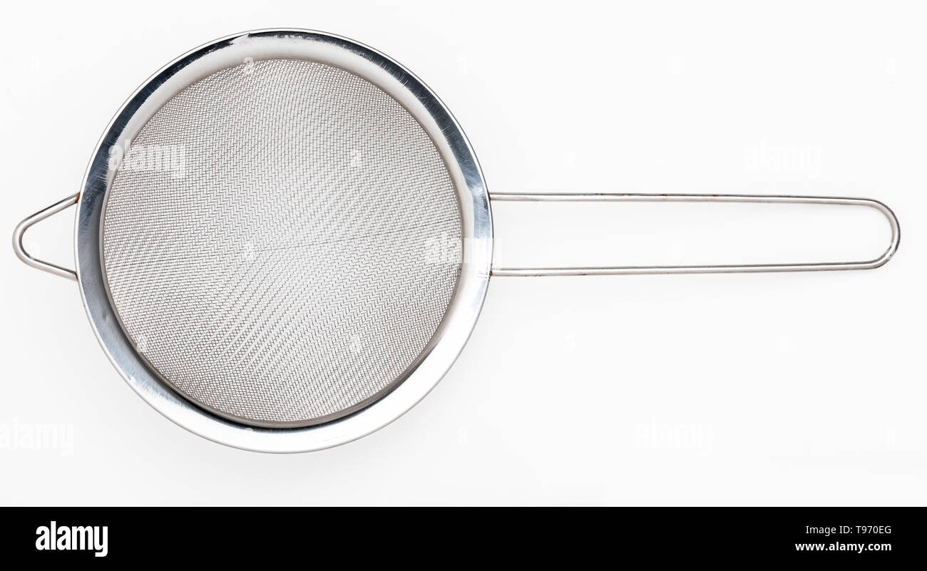 Metallic colander for cooking (kitchenware collection). Isolated on white background. Stock Photo