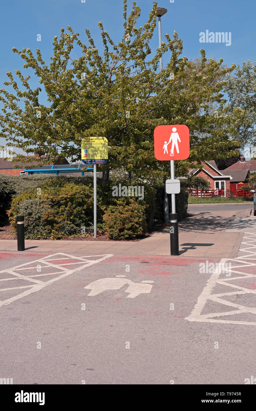 A Sainsburys parent and child parking space Stock Photo