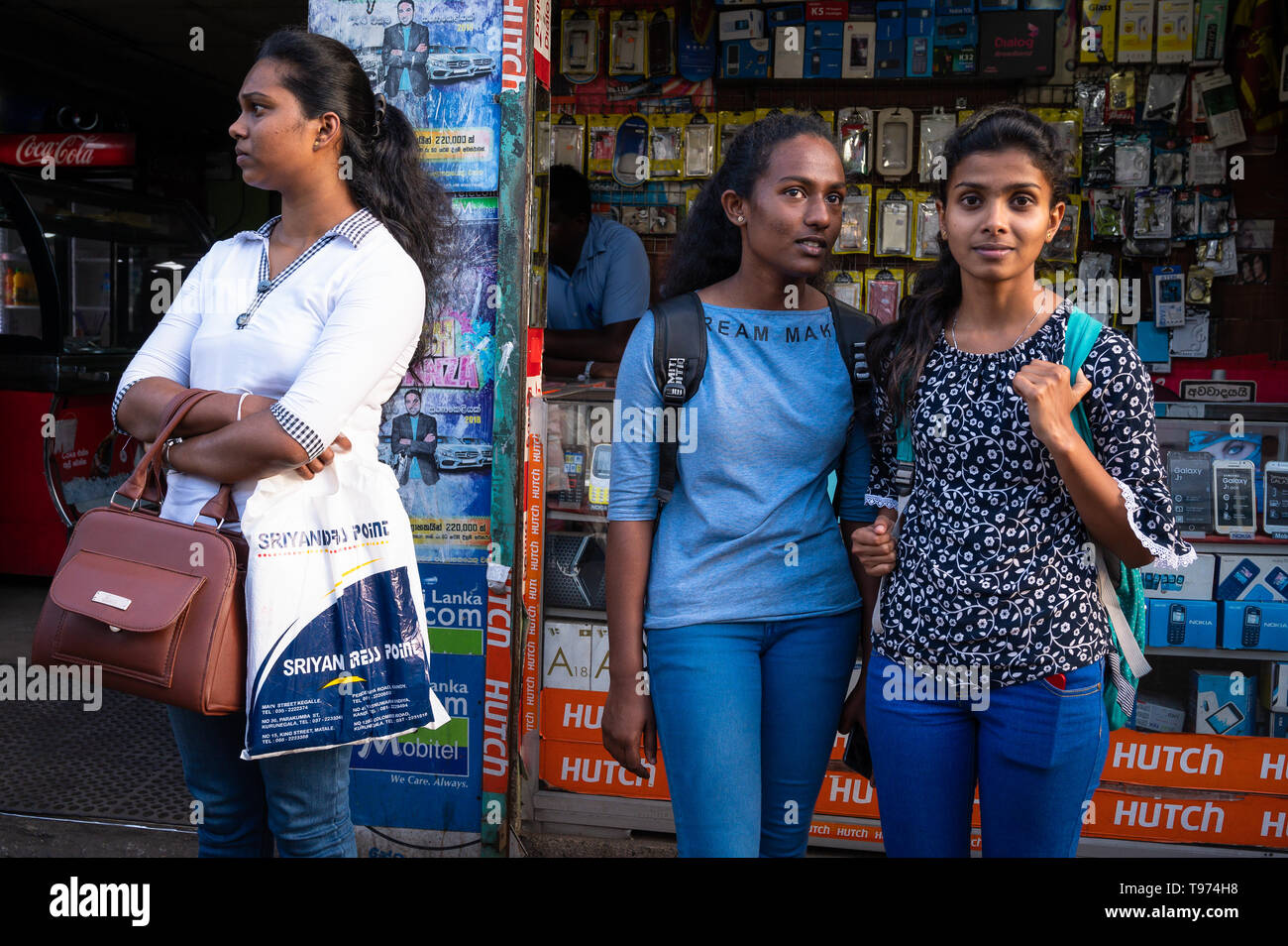 Women standing on the street, Kandy, Sri Lanka Stock Photo