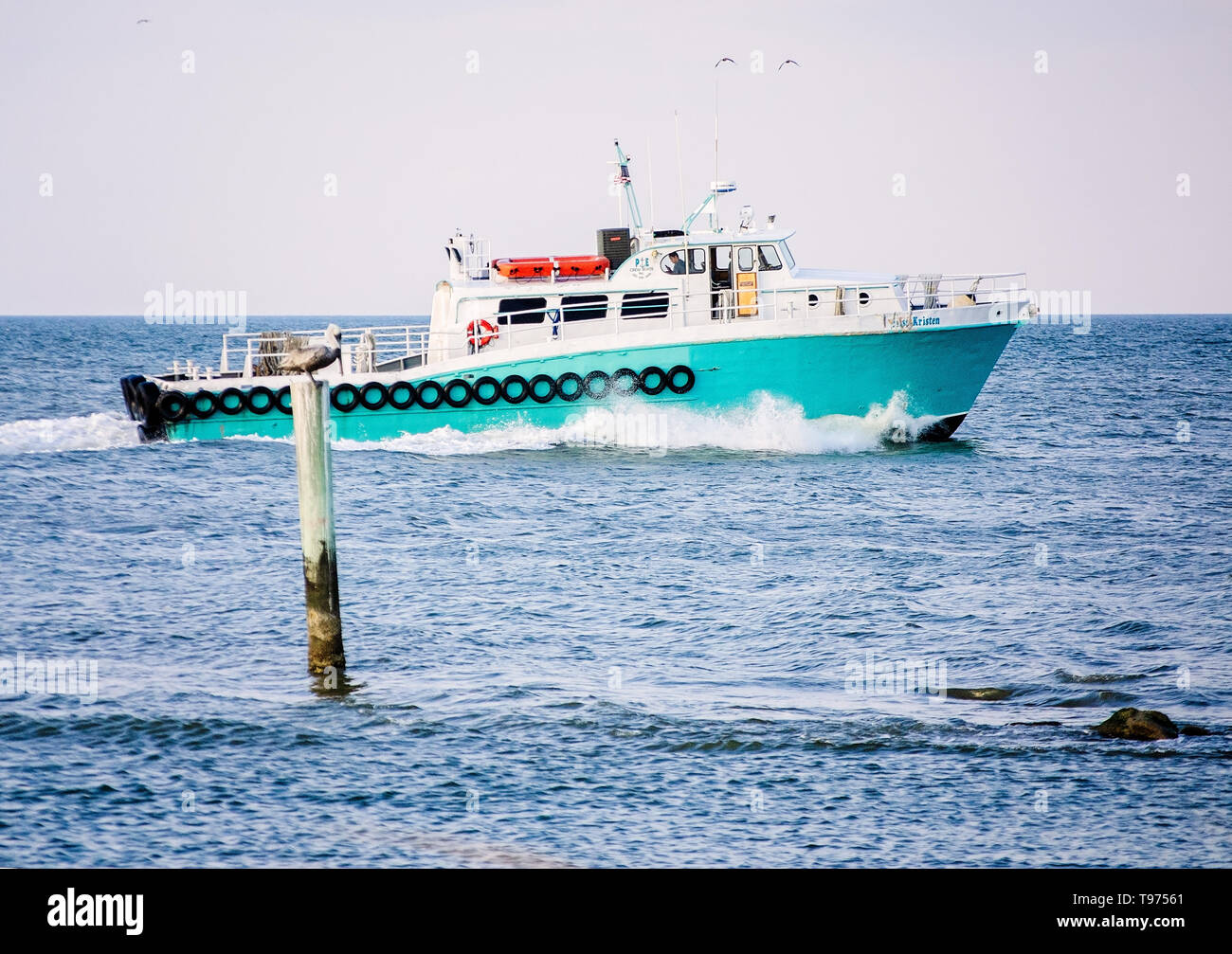 Miss Kristen, a crew boat owned by P&E Crew Boats, leaves port, Oct. 31, 2018, in Dauphin Island, Alabama. Stock Photo