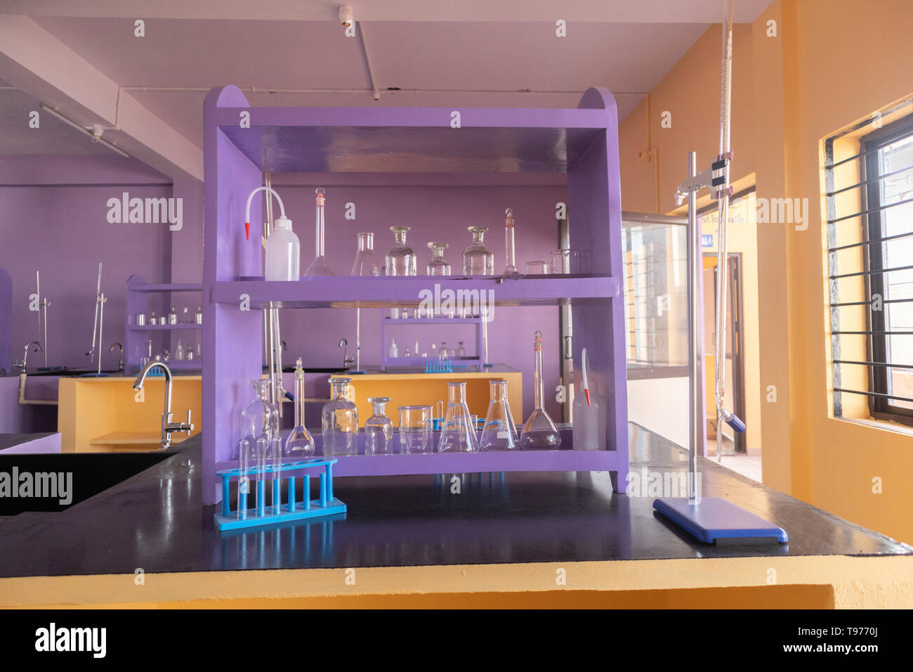 Well arranged lab glassware at Empty Science laboratory. Stock Photo