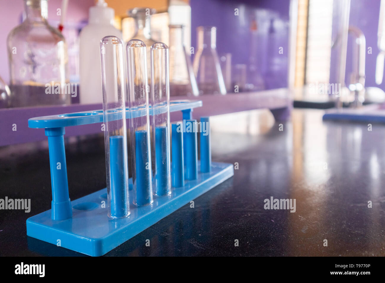 Well arranged lab glassware or empty glass tubes at Empty Science laboratory Stock Photo