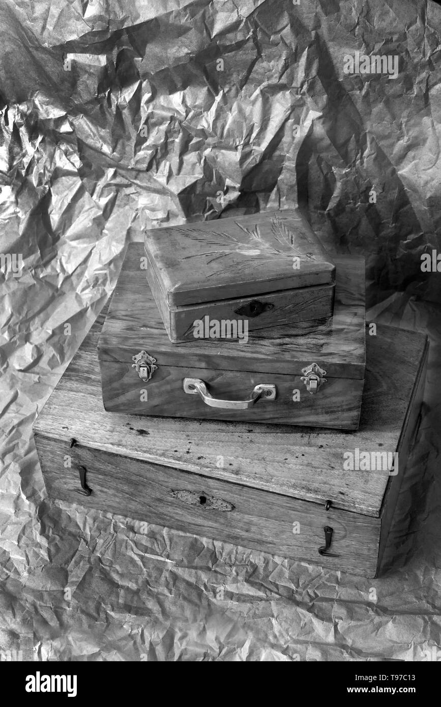 three wooden boxes stacked, black and white Stock Photo