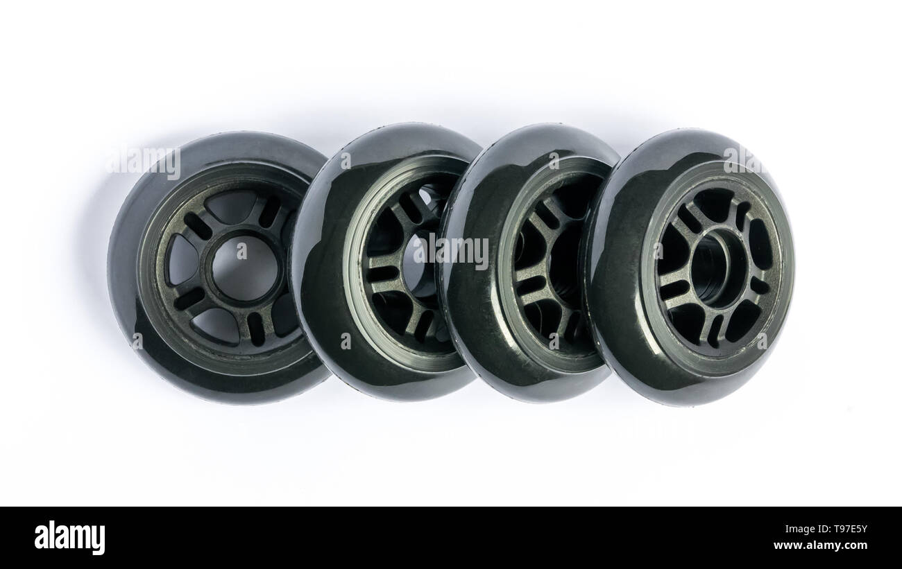 Inline skate wheels, four rollerblade wheels isolated on white
