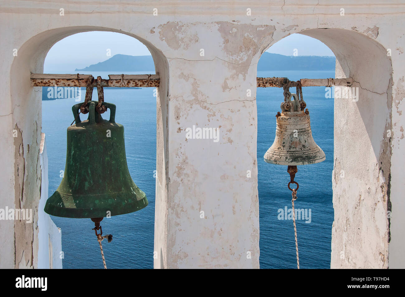 Weathered Bell Tower overlooking The Caldera, Fira, Santorini, Greek Islands, Greece Stock Photo