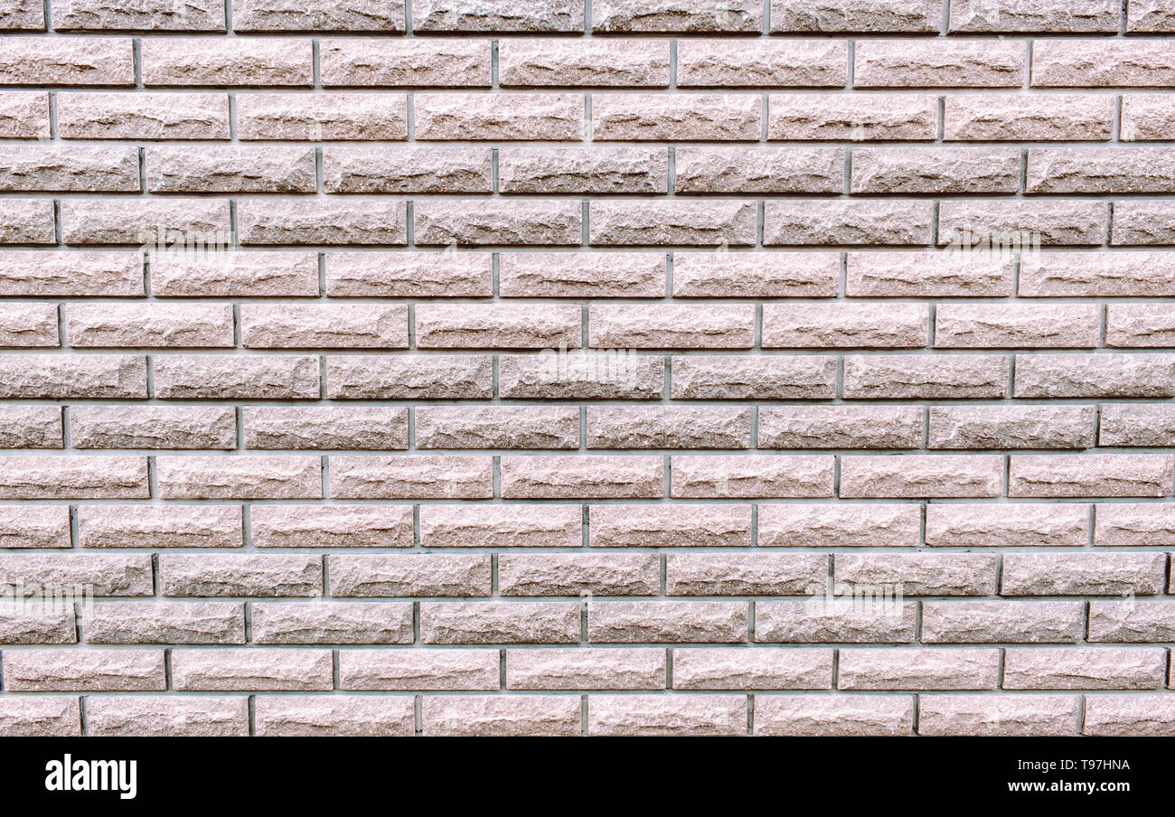 wide textured texture of an old light, white brick wall abstract background for design Stock Photo