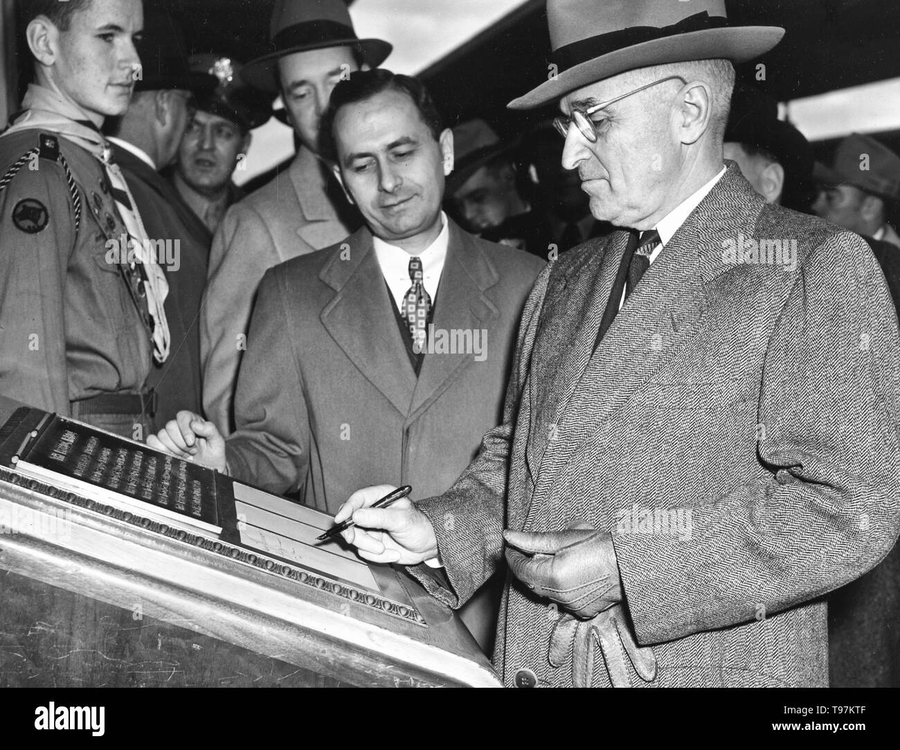Photograph of President Harry S. Truman as He Signs the Guestbook of Freedom Train Stock Photo
