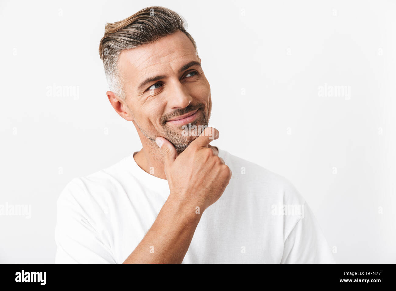 Positive joyful man touching hi-res stock photography and images - Alamy