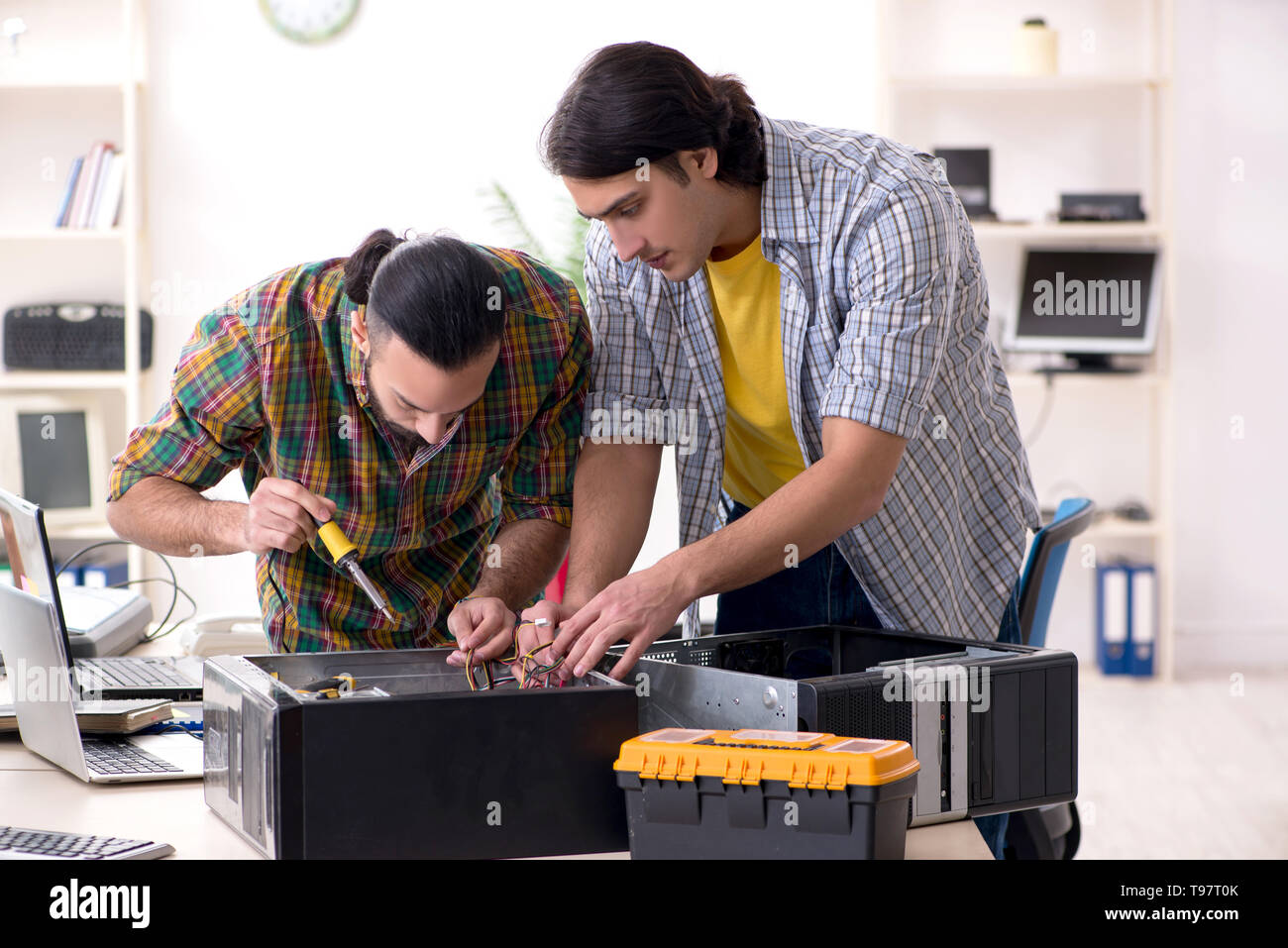 IT engineers working on hardware issue Stock Photo