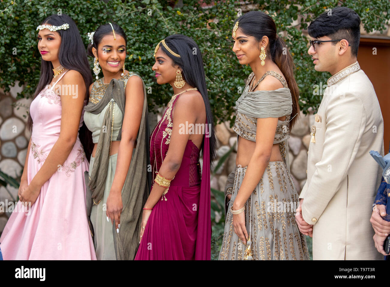 A bevy of models line up at a 'Bollywood' bridal fashion festival for wealthy Indian Americans in Garden Grove, CA. Stock Photo