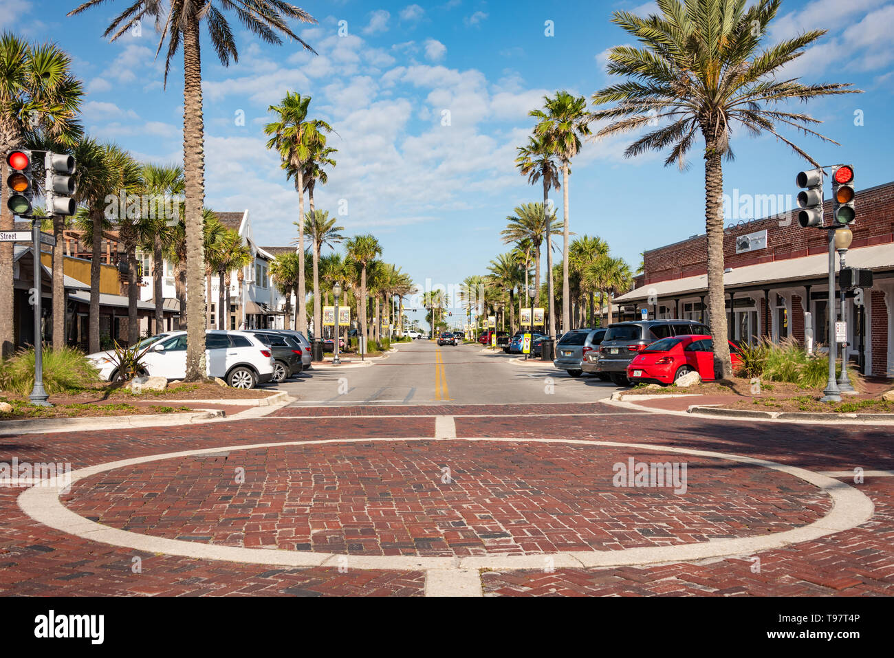 Beach town local restaurants line the street between Florida A1A and Ocean Boulevard at the dividing line between Atlantic Beach and Neptune Beach, FL. Stock Photo