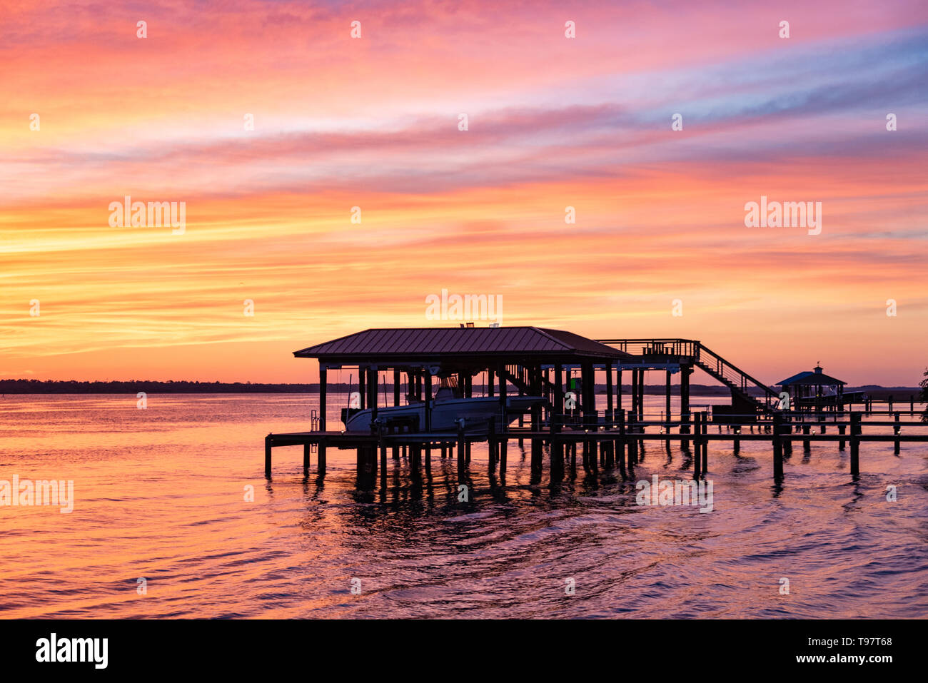 Vibrant sunset view of the Intracoastal Waterway (Tolomato River) from Caps on the Water in St. Augustine, Florida. (USA) Stock Photo