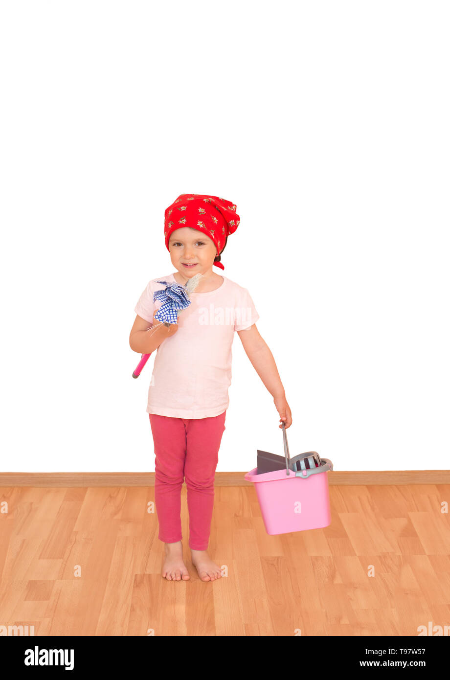 Little girl with mop, broom and bucket ready for spring cleaning